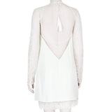 An intricate long-sleeve french lace sequin dress in white by Emilio Pucci