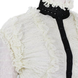 Alexander McQueen luxurious cardigan in an ivory and black sheer ruched lace