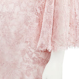 A luxurious Emilio Pucci cocktail dress in intricate sheer pink lace