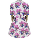 A short dress in a floral pattern by Caterina Gatta