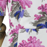 A short dress in a floral pattern by Caterina Gatta