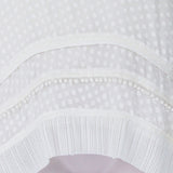 Proenza Schouler ivory tunic top in an embossed polka dot pattern