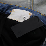 R13 washed Japanese selvedge denim shorts with attached leather leggings