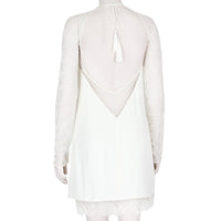 An intricate long-sleeve french lace sequin dress in white by Emilio Pucci