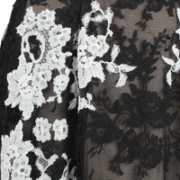 An exquisite Erdem dress in intricately embroidered black and white lace