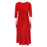 An elegant midi dress in pillar box red by Giambattista Valli