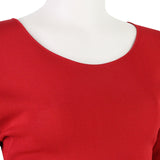 An elegant midi dress in pillar box red by Giambattista Valli