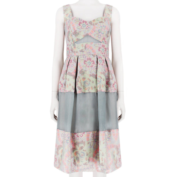 A runway collection Erdem dress in multicoloured floral jaquard with sheer pale grey voile overlay