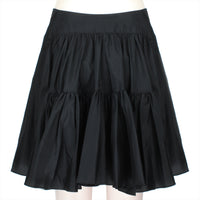 Alaia silk plume skirt in a black silk satin fabric