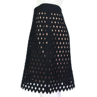 Alaia layered skirt in a black diamond mesh top layer