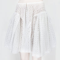 Alaia skater skirt in a sheer macrame soleil pattern white