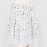 Alaia skater skirt in a sheer macrame soleil pattern white