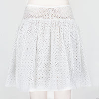 Alaia skater skirt in a sheer macrame soleil pattern white