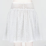 Alaia skater skirt in a sheer macrame soleil pattern white