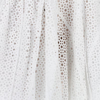 Alaia skater skirt in a sheer macrame soleil pattern white