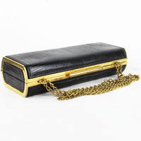 Vintage Gucci purse finished in black lizard leather