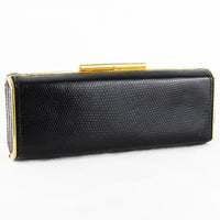 Vintage Gucci purse finished in black lizard leather