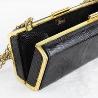 Vintage Gucci purse finished in black lizard leather