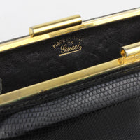 Vintage Gucci purse finished in black lizard leather