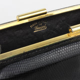 Vintage Gucci purse finished in black lizard leather