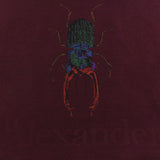 Alexander McQueen claret scarf in a wool and silk blend with scarab beetle detailing