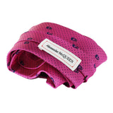 Alexander McQueen silk tie in fuchsia pink and midnight blue skull and dot pattern