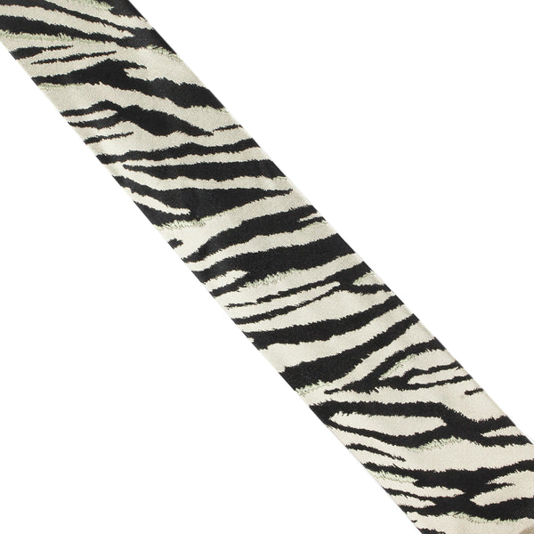 Dries Van Noten tie in a zebra jacquard pattern Monochrome zebra pattern to narrow part of tie with contrasting pale sage twill stripe