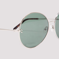Stella McCartney rounded sunglasses in a silver tone metal frame