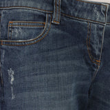 Balmain distressed bootcut jeans in a mid-blue denim
