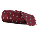Dunhill mulberry silk tie with a cufflink pattern