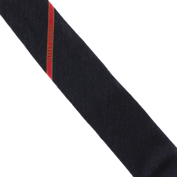 Dunhill selvedge tie in a luxuriously soft wool fabric Striped logo repeat pattern
