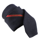 Dunhill selvedge tie in a luxuriously soft wool fabric Striped logo repeat pattern