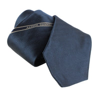 Dunhill luxuriously thick mulberry silk tie in a twill and herringbone pattern Single selvedge logo stripe to the blade