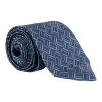 Dunhill silk tie featuring an abstract longtail print inspired by the exaggerated typography of the iconic dunhill logo.