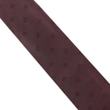 Dunhill silk tie in a repeat monogram pattern