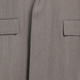 Dunhill coat in an olive grey marl twill wool fabric Notch lapels with an ochra tonę velvet collar