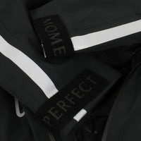 Perfect Moment ski suit in black with reflective detailing