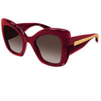 Alexander McQueen sunglasses in an oversize ruby red frame