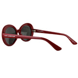 Saint Laurent Surf oval sunglasses in a cherry red tone