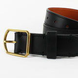 Dunhill black leather belt with rounded brass tone buckle