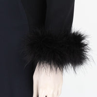 Saint Laurent luxurious feather covered snap cuffs in black