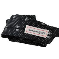 Alexander McQueen narrow silk tie in a signature skull and dot pattern