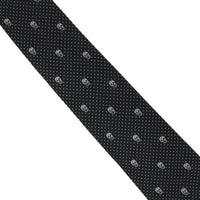 Alexander McQueen silk tie in a signature skull and dot pattern