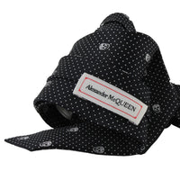 Alexander McQueen silk tie in a signature skull and dot pattern