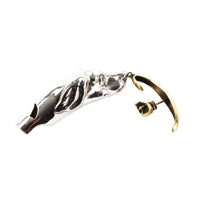 Alexander McQueen dog whistle singular earring in silver and gold