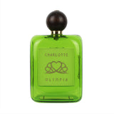 Charlotte Olympia perfume bottle clutch in translucent green plexiglass