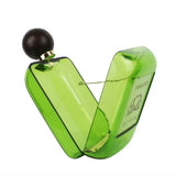 Charlotte Olympia perfume bottle clutch in translucent green plexiglass