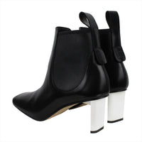 Loewe blade heel ankle boots in black and white