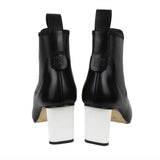 Loewe blade heel ankle boots in black and white