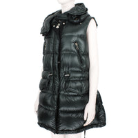 Moncler sleeveless long down jacket in a dark green tone